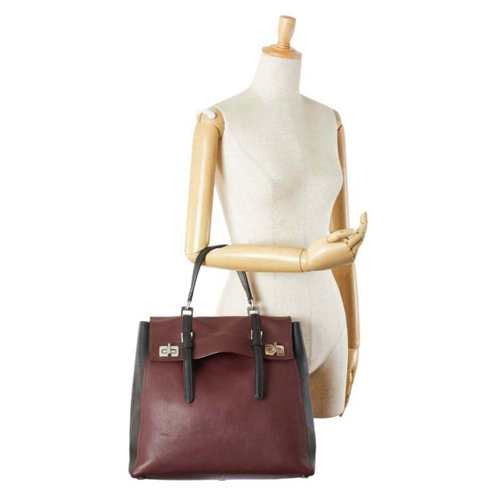 Prada handbag in wine red and black leather for women. - Picture 15 of 15